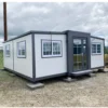 130d33_54c9aa54d15a4634beec11fc40dd63f2mv2.webp Conteneur dhabitation mobile Tiny House de luxe 20 pieds-Neuf – Pri...