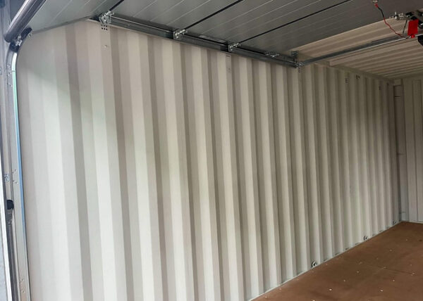 c541a2_5490e2f1cb464b57838f3689e74cb583mv2.jpg Conteneur Maritime 20 avec Portes Garage Sectionnelles-Neuf – Devis...