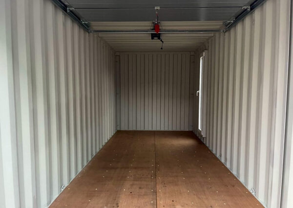 c541a2_88e5f6f373d944b5b15b0067428cd565mv2.jpg Conteneur Maritime 20 avec Portes Garage Sectionnelles-Neuf – Devis...